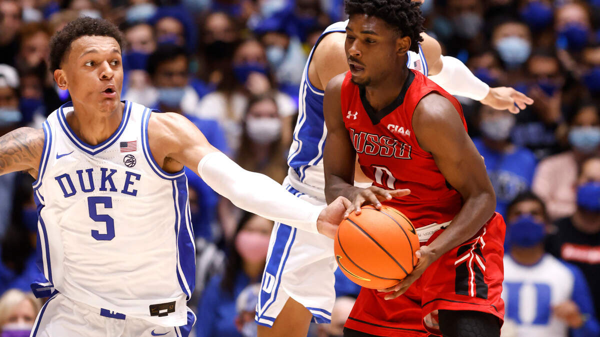 Duke’s Paolo Banchero (5) steals the ball from Winston-Salem State’s Justice Kithcart (0) during the first half of Duke’s exhibition game against Winston-Salem State University at Cameron Indoor Stadium in Durham, N.C., Saturday, Oct. 30, 2021.