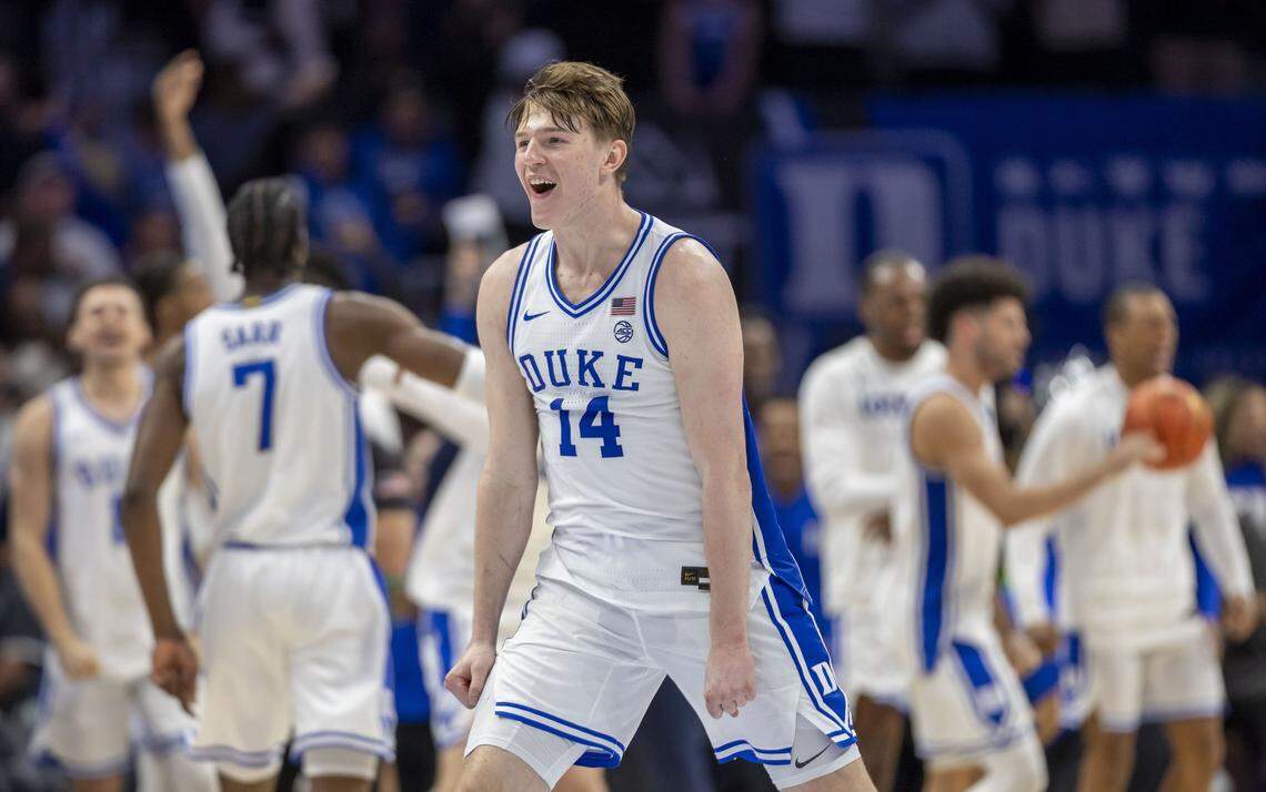 Duke guard Nikolas Khamenia (14) celebrates the Blue Devils’ 74-70 victory over Virginia in the ACC Championship game on Saturday, March 14, 2026, at Spectrum Center in Charlotte, N.C.
