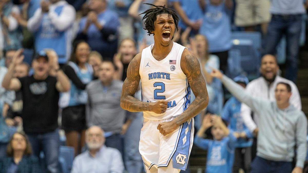 North Carolina’s Caleb Love (2) reacts after sinking a basket to give the Tar Heels’ a 75-67 lead over Wake Forest the second half on Wednesday, January 4, 2023 at the Smith Center in Chapel Hill, N.C. North Carolina defeated Wake Forest 88-79.