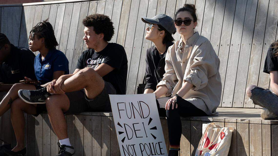 Students from various UNC System universities rally outside the system office in Raleigh Thursday, May 23, 2024, ahead of the Board of Governors’ vote on a policy to repeal DEI mandates at all NC public universities.