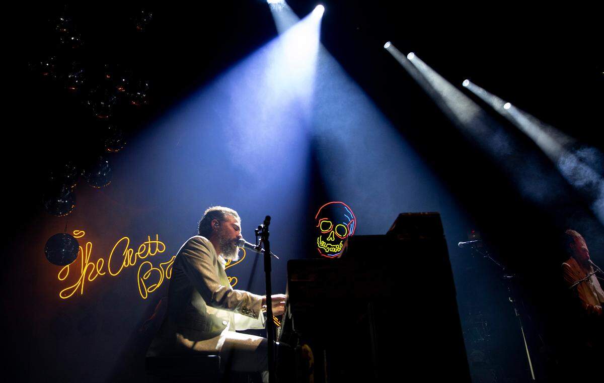 Scott Avett performs on piano as The Avett Brothers play Raleigh’s PNC Arena for their annual New Year’s Eve show, Dec. 31, 2023.