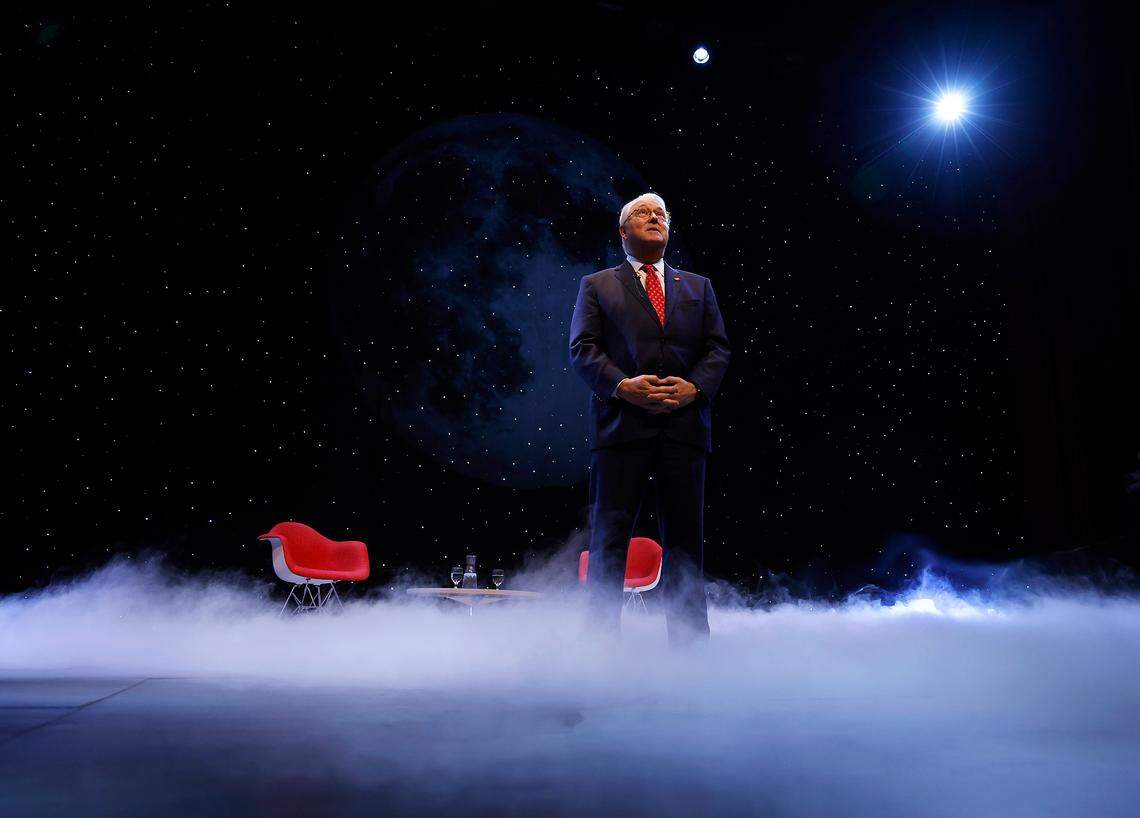Smoke billows across the stage as NC State Chancellor Randy Woodson prepares to introduce NC State alumna and NASA astronaut Christina Koch during his annual fall address on Monday, Oct. 23, 2023, in Talley Student Union’s Stewart Theater.