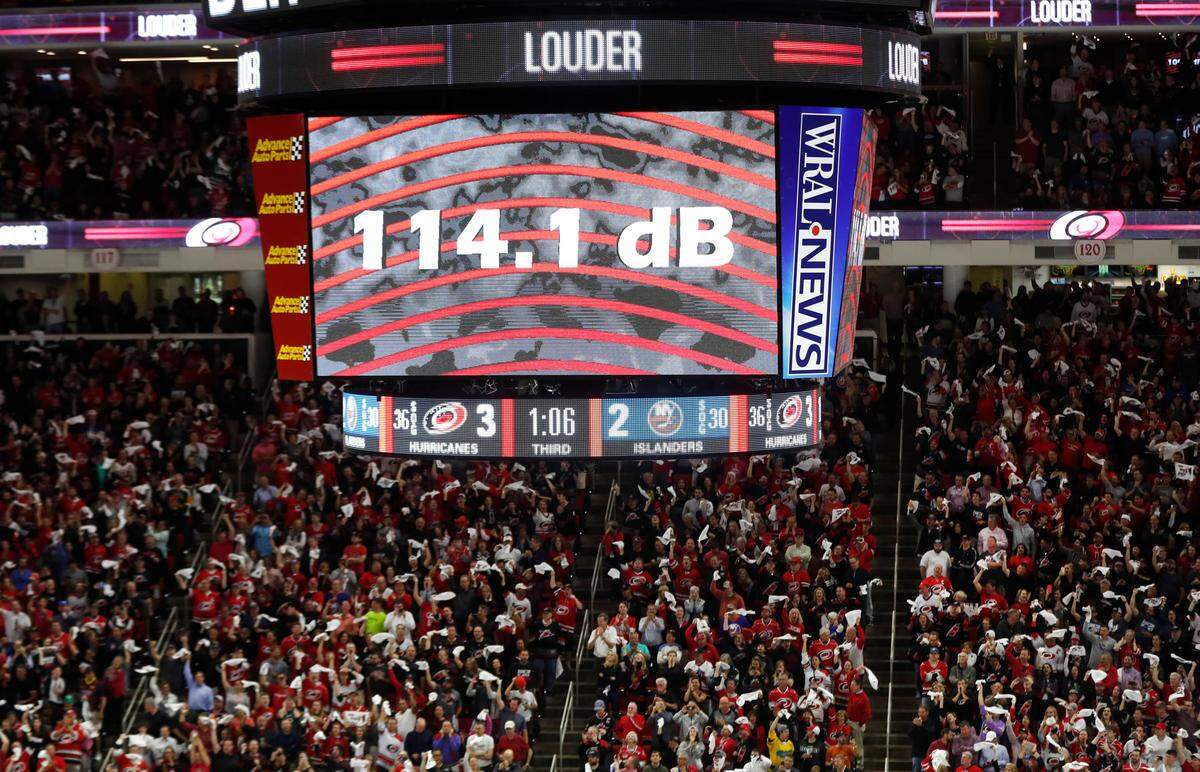 Canes fans cheer on the team during the third period of the Carolina Hurricanes’ 5-2 victory over the New York Islanders at PNC Arena in Raleigh Wednesday, May 1, 2019.