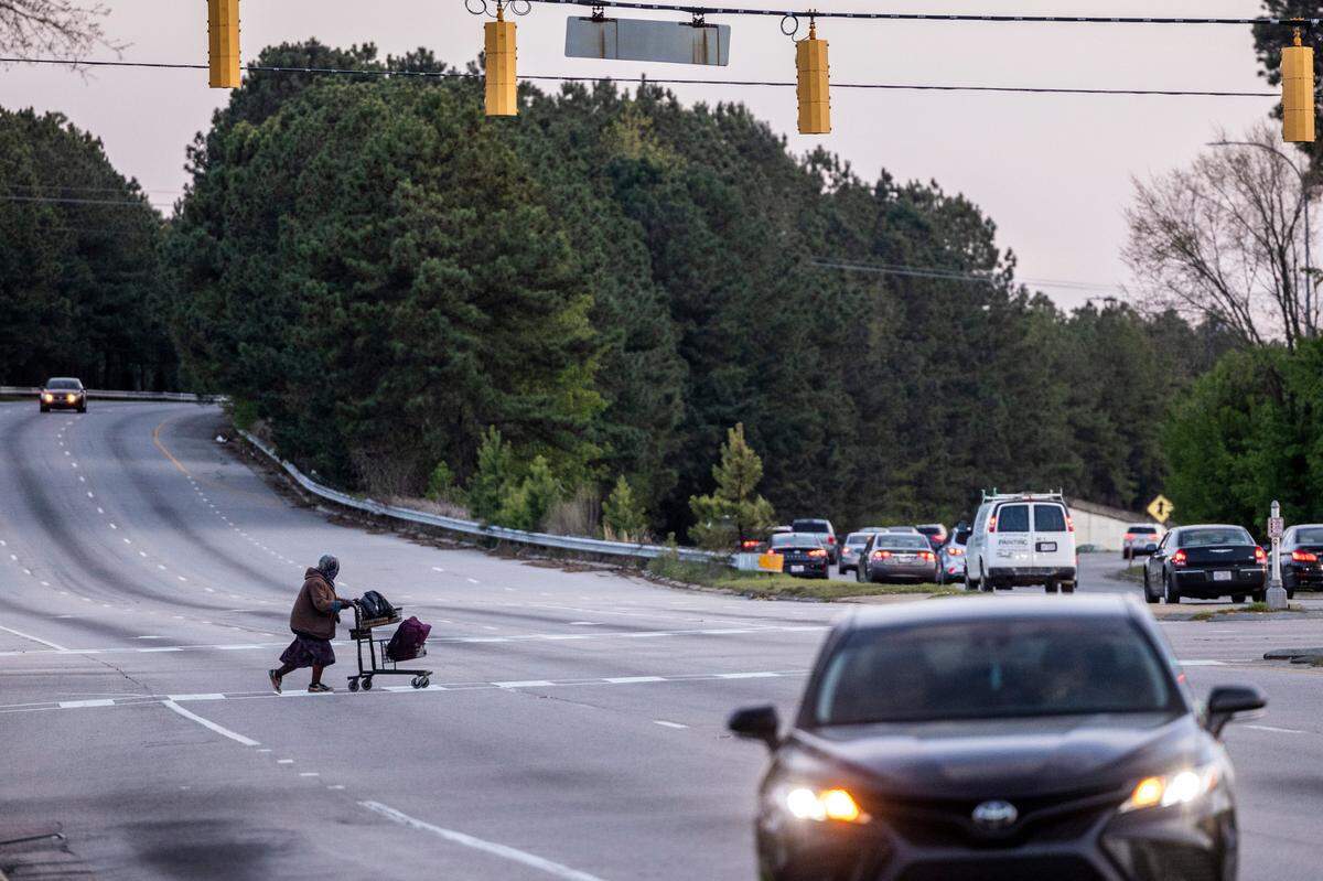 A pedestrian crosses the same portion of Capital Blvd. where Diane Marie Bass, 59, was walking on the shoulder before dawn on an August Sunday morning when the driver of an SUV drifted off the road and hit her going 55 mph.