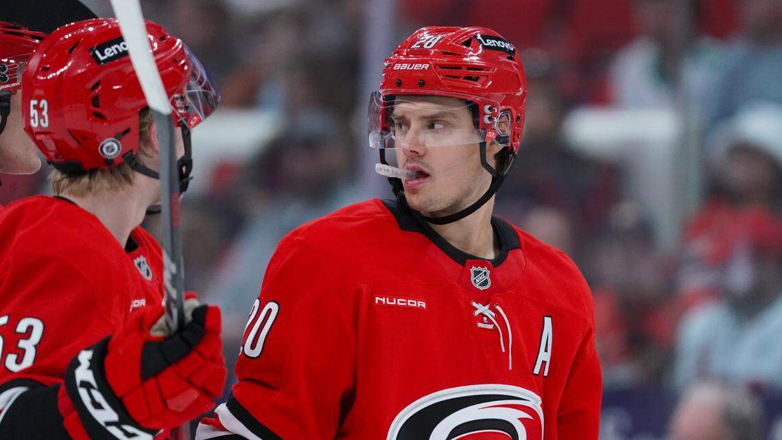 Nov 17, 2024; Raleigh, North Carolina, USA; Carolina Hurricanes center Sebastian Aho (20) looks on against the St. Louis Blues during the second period at Lenovo Center. Mandatory Credit: James Guillory-Imagn Images