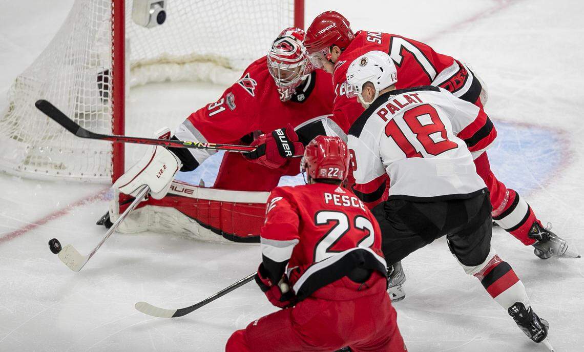 Carolina Hurricanes goalie Frederik Andersen (31) stops a scoring attempt by New Jersey Devils Ondrej Palat (18) in the second period during Game 1 of their second round Stanley Cup playoff series on Wednesday, May 3, 2023 at PNC Arena in Raleigh, N.C.