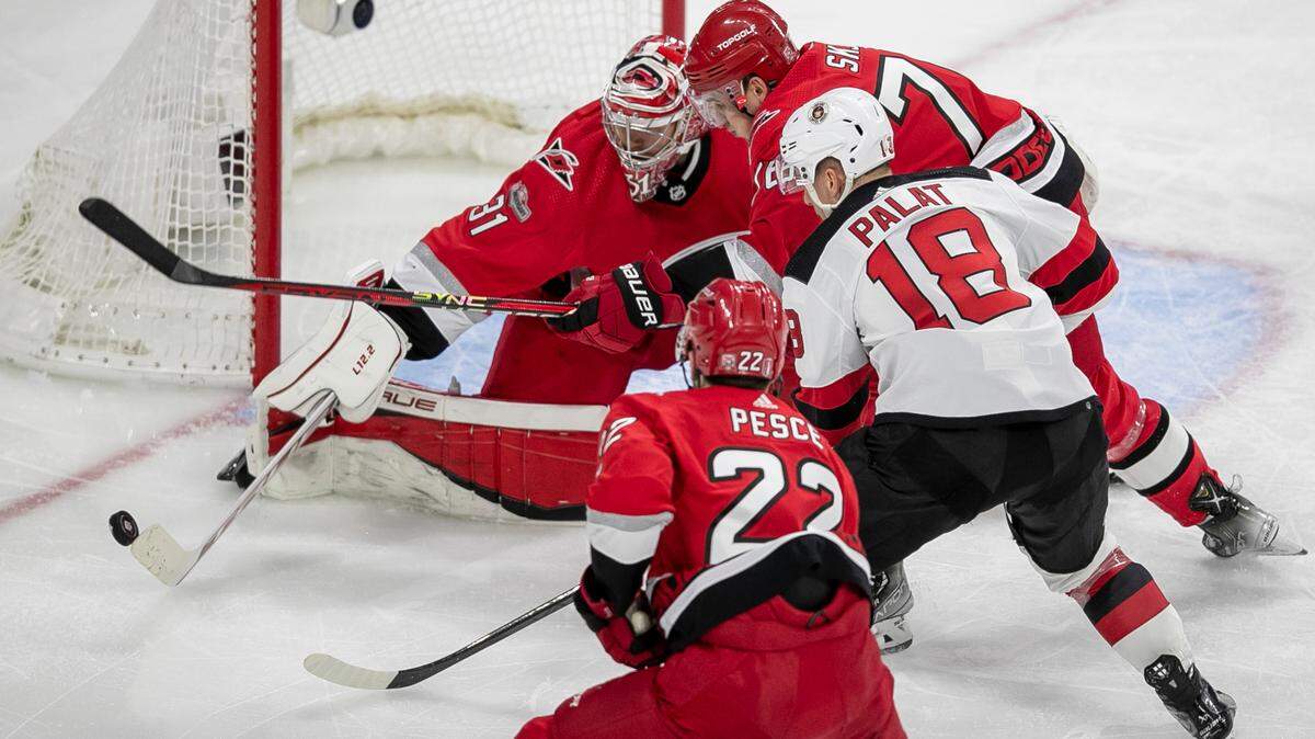 Carolina Hurricanes goalie Frederik Andersen (31) stops a scoring attempt by New Jersey Devils Ondrej Palat (18) in the second period during Game 1 of their second round Stanley Cup playoff series on Wednesday, May 3, 2023 at PNC Arena in Raleigh, N.C.
