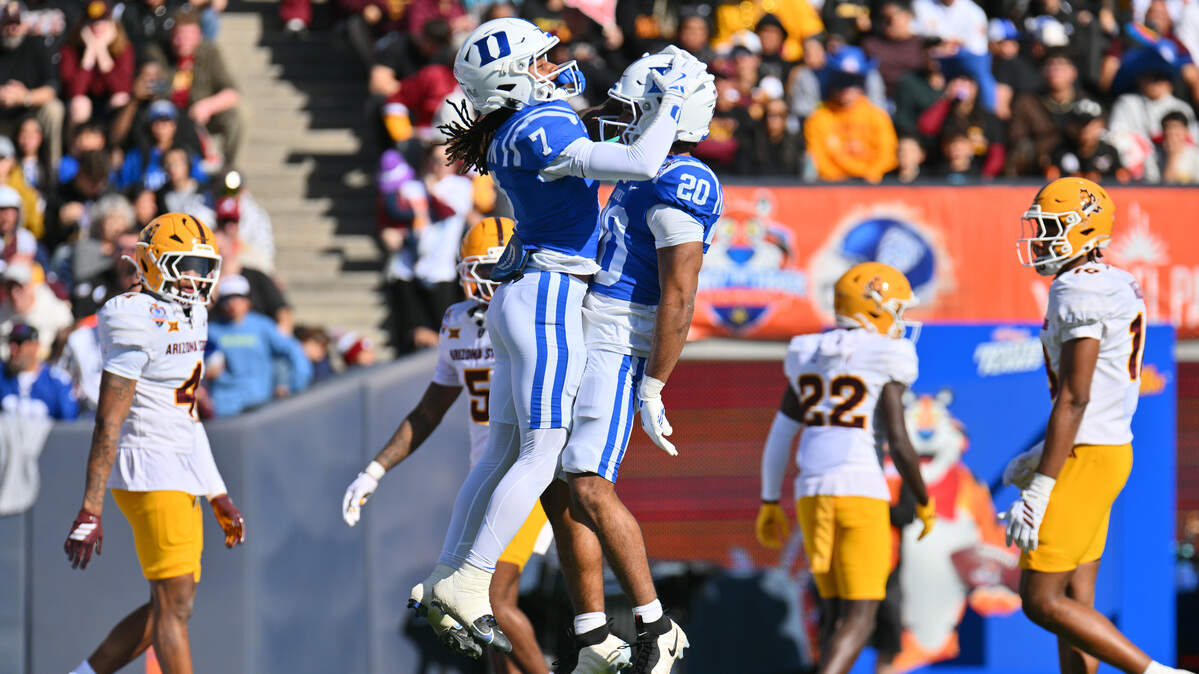 Duke wide receiver Que'Sean Brown, left, and running back Nate Sheppard celebrate after Brown caught a pass against the Arizona State Sun Devils during the first half of the Tony The Tiger Sun Bowl game at Sun Bowl Stadium on Dec. 31, 2025 in El Paso, Texas.