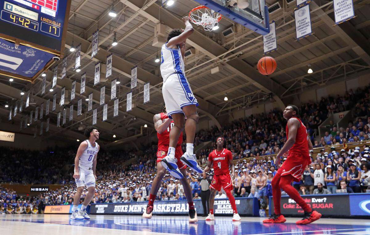 Duke’s Sean Stewart (13) slams in two during Duke’s 84-59 victory over Louisville at Cameron Indoor Stadium in Durham, N.C., Wednesday, Feb. 28, 2024.