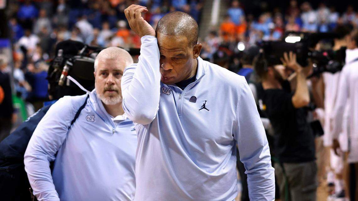 North Carolina head coach Hubert Davis walks off the court after Virginia’s 68-59 victory over UNC in the quarterfinals of the ACC Men’s Basketball Tournament in Greensboro, N.C., Thursday, March 9, 2023.