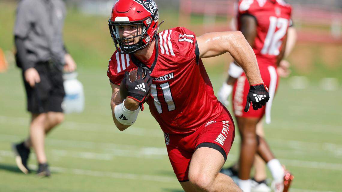 N.C. State linebacker Payton Wilson (11) runs upfield while running a drill during the Wolfpack’s first practice of fall camp in Raleigh, N.C., Wednesday, August 3, 2022.