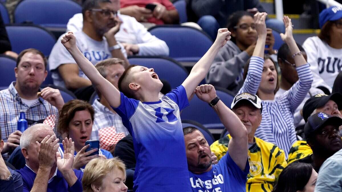 Fans cheer on the Blue Devils during the second half of Duke’s game against Pitt in the quarterfinals of the ACC Men’s Basketball Tournament in Greensboro, N.C., Thursday, March 9, 2023.