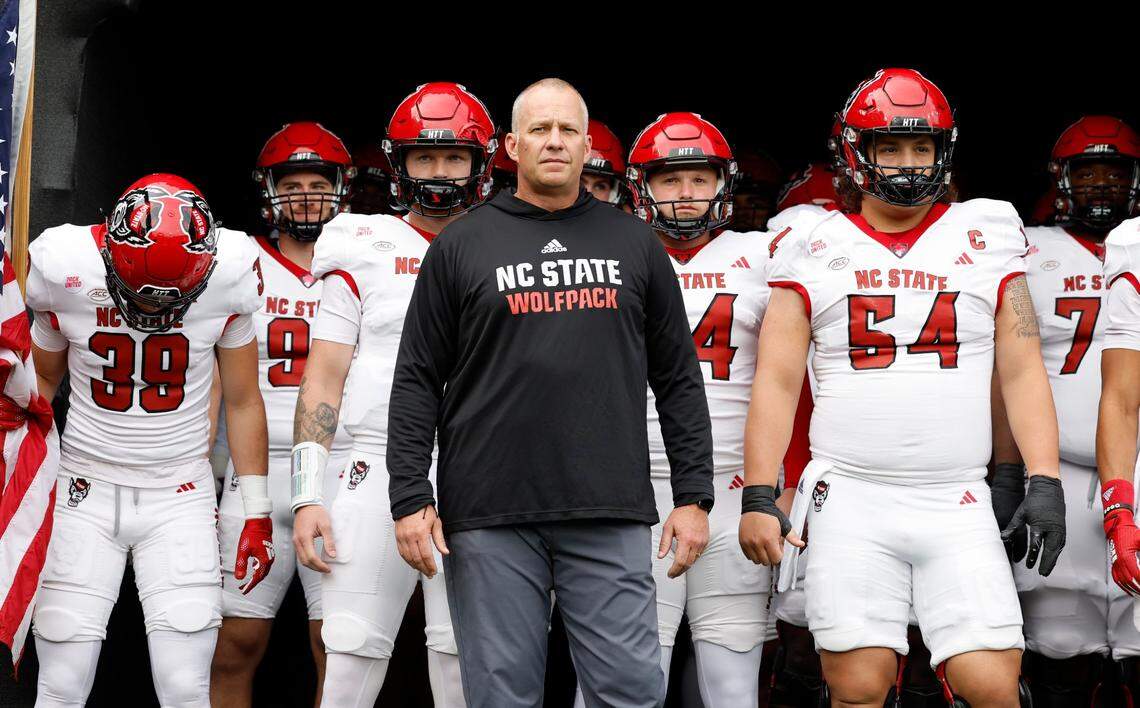 N.C. State head coach Dave Doeren gets ready to lead his team out onto the field before the Wolfpack’s game against Wake Forest at Allegacy Stadium in Winston-Salem, N.C., Saturday, Nov. 11, 2023.