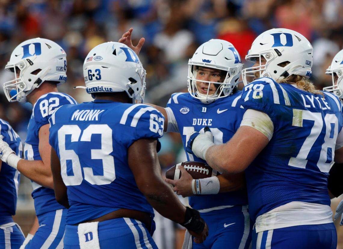 Duke Blue Devils quarterback Riley Leonard, center, celebrates with teammates following a Blue Devils touchdown during the first half of Dukes game against North Carolina A&T at Wallace Wade Stadium in Durham, N.C. on Saturday, Sept. 17, 2022.