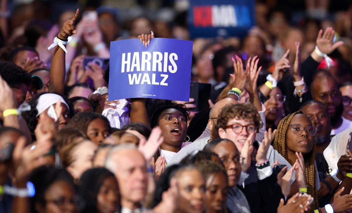 Spectators cheer on Vice President and democratic nominee for president Kamala Harris during a rally at the Greensboro Coliseum in Greensboro, N.C., Thursday, Sept. 12, 2024.
