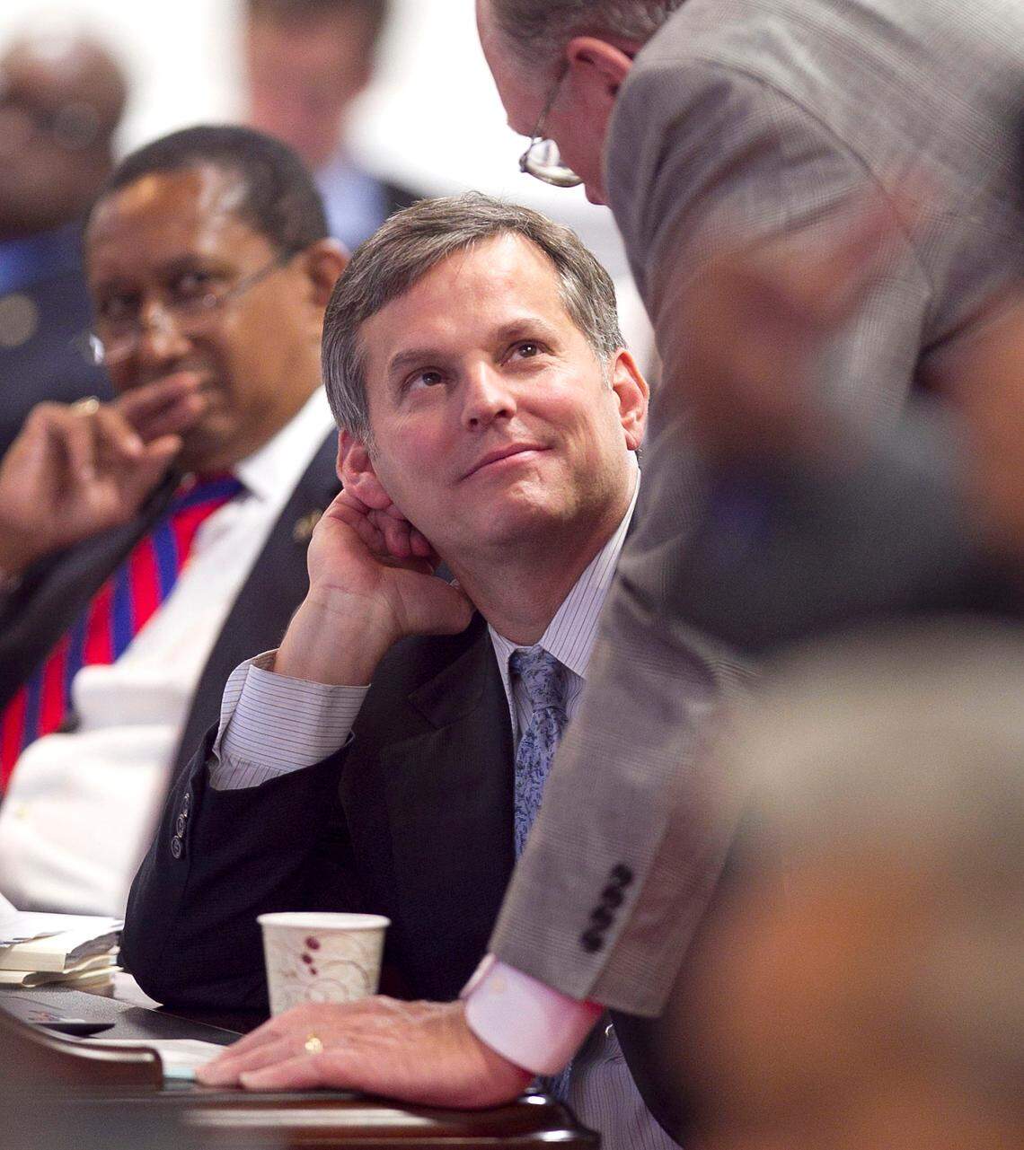 N.C. Sen. Josh Stein listens to N.C. Sen. Jerry W. Tillman during debate of HB 1050, Omnibus Tax Law Changes, in the North Carolina State Senate in May 2014.