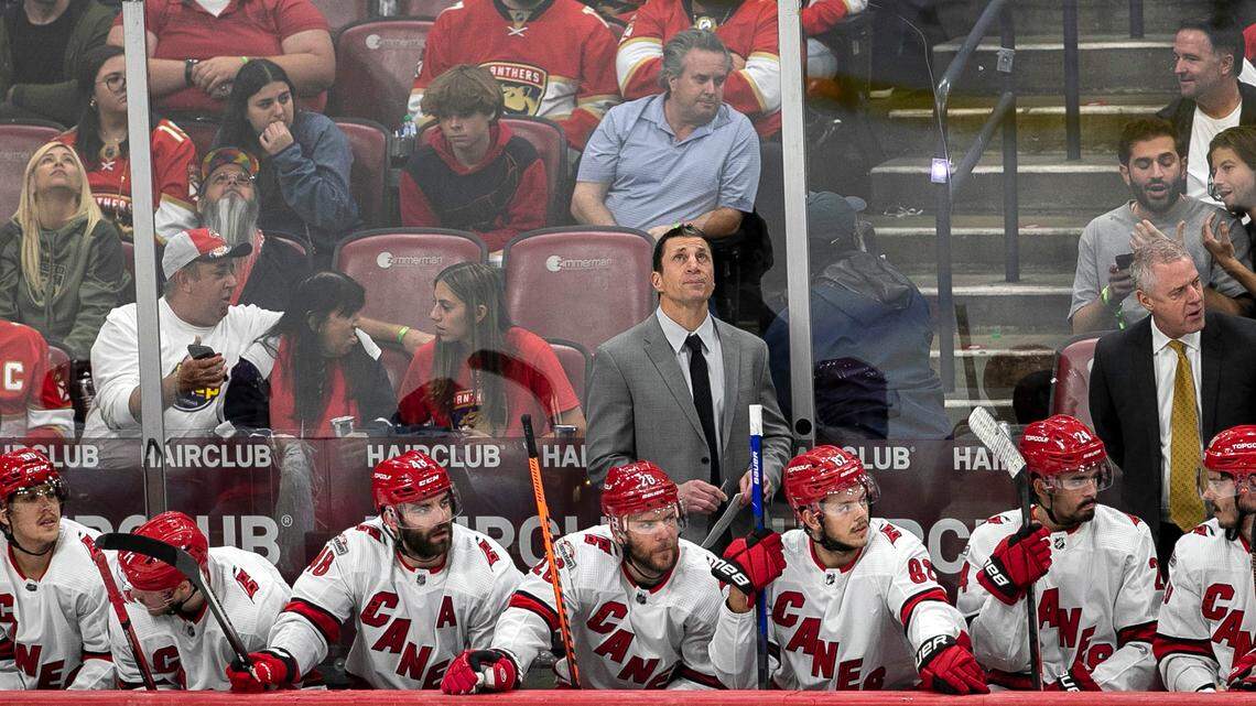 Down 1-0, Carolina Hurricanes coach Rod Brind’Amour checks the clock with 3:30 to play in the third period, before pulling goalie Frederik Andersen (31), during Game 3 of the Eastern Conference Finals against the Florida Panthers on Monday, May 22, 2023 at FLA Live Arena in Sunrise, Fla.