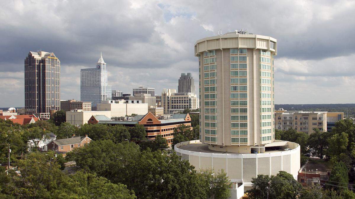 A 2012 News & Observer file photo of the Clarion Hotel, right, on Hillsborough Street in downtown Raleigh before it was renovated and converted to a Holiday Inn.