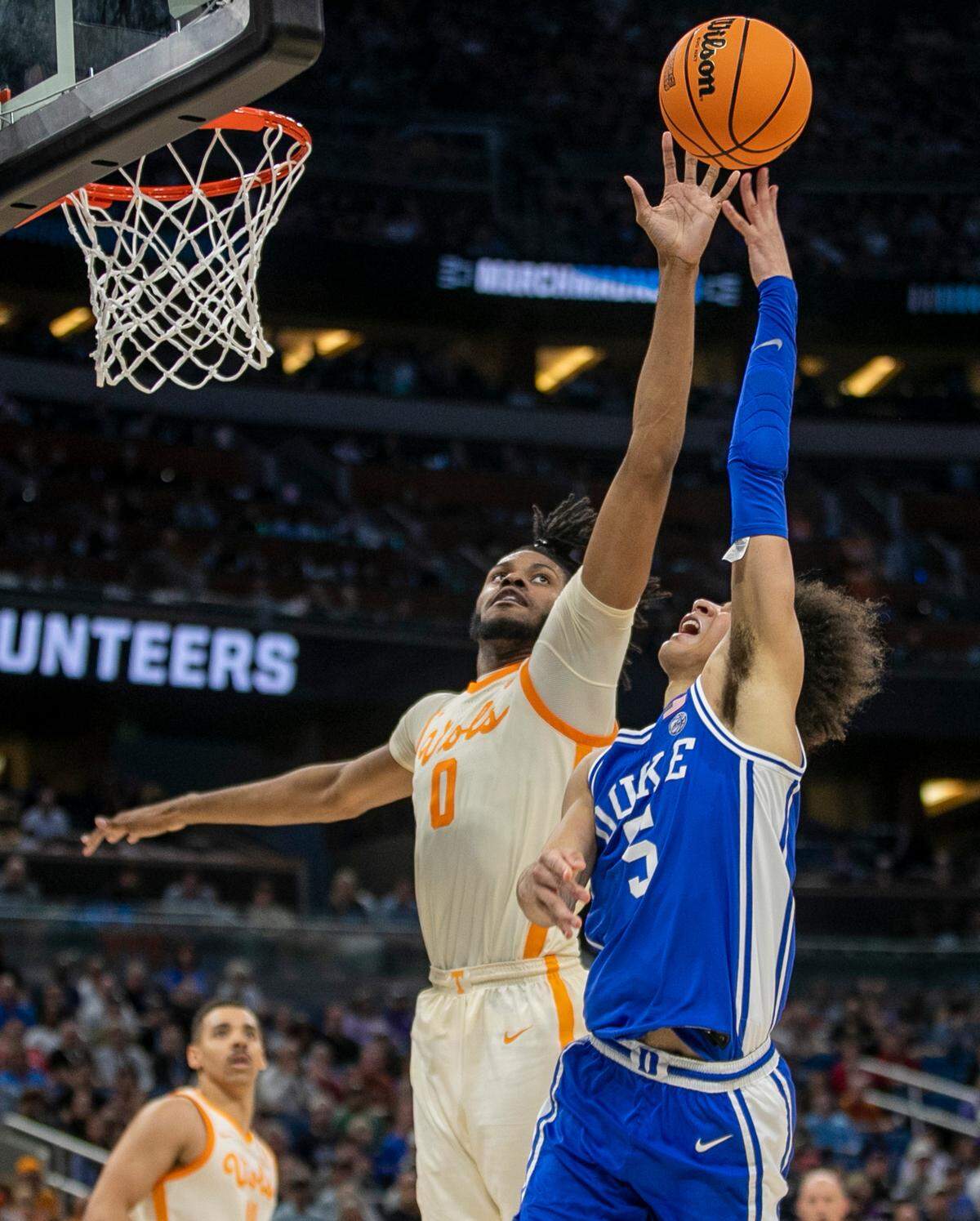 Tennesse’s Jonas Aidoo (0) blocks a shot by Duke’s Tyrese Proctor (5) during the second half in the second round of the NCAA Tournament on Saturday, March 18, 2023 at the Amway Center in Orlando, Fla. Aidoo had three blocks in the Volunteers’ victory.