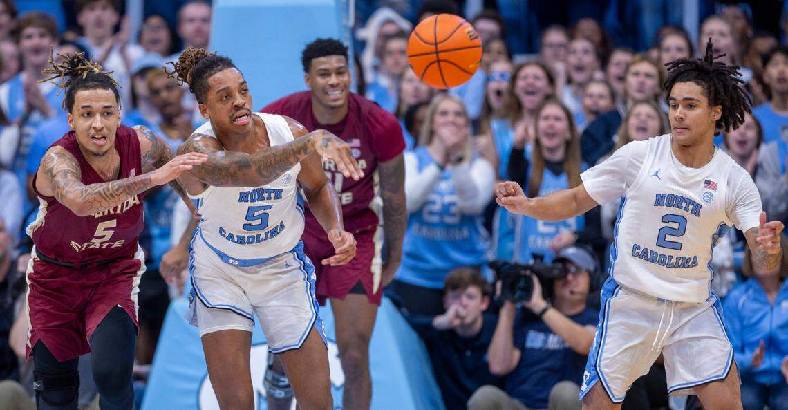 North Carolina’s Armando Bacot (5) and Elliot Cadeau (2) start a fast break after a Florida State turnover in the first half on Saturday, December 2, 2023 at the Smith Center in Chapel Hill, N.C.