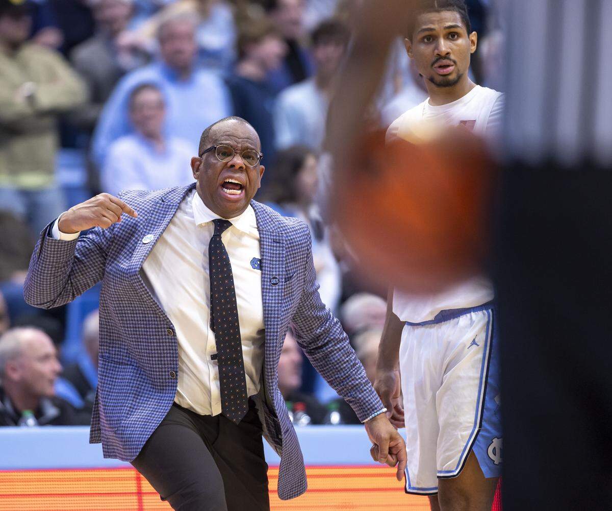 North Carolina coach Hubert Davis, yells at the official after after Wake Forest guard Mekhi Mason (8) fouled North Carolina guard Seth Trimble (7) with 13 seconds to play in the game on Saturday, January 10, 2026 at the Smith Center in Chapel Hill, N.C.