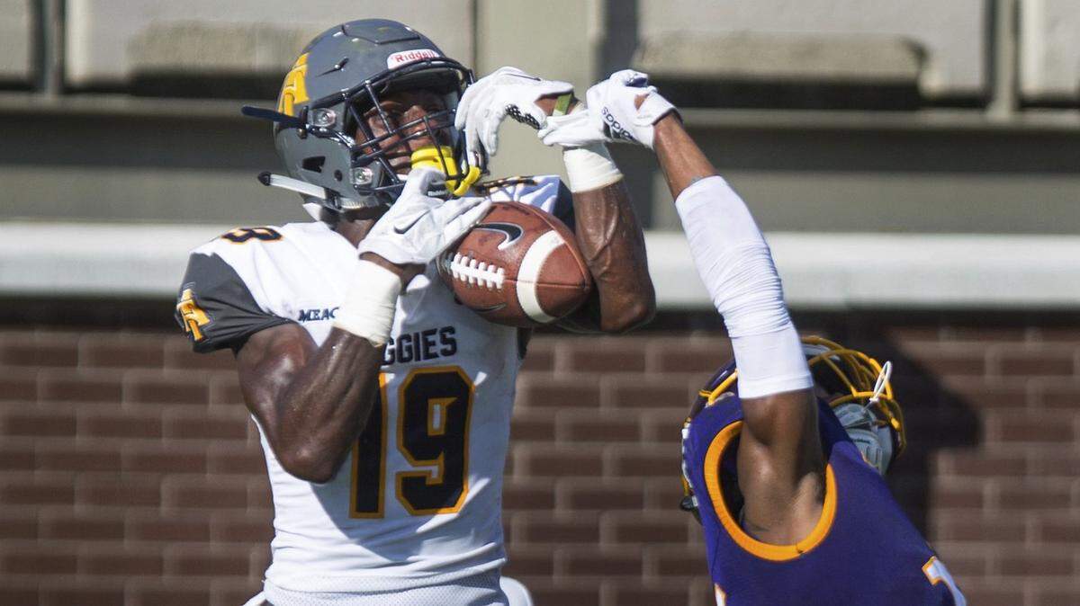 North Carolina A&T’s Zachary Leslie, left, makes the catch for a touchdown while being defended by East Carolina’s Colby Gore during an NCAA college football game Sunday, Sept. 2, 2018, in Greenville, N.C.