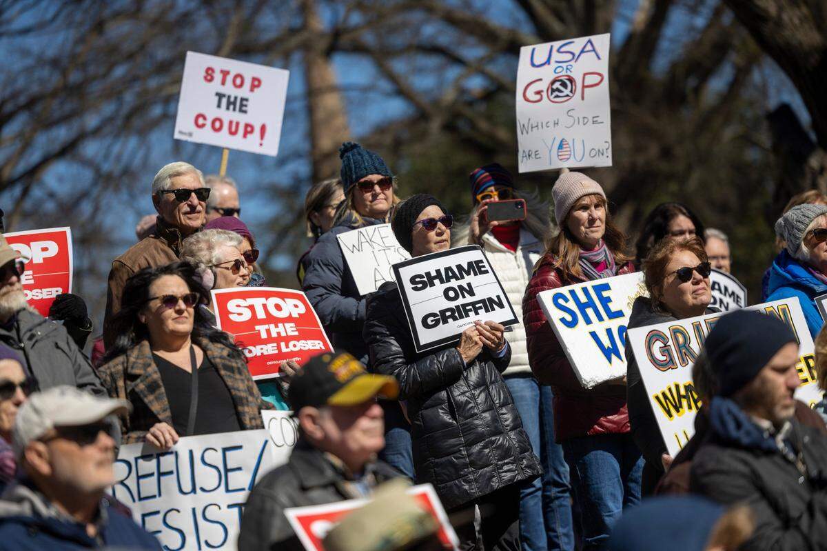 Hundreds of demonstrators rally at the North Carolina State Capitol on Monday, Feb. 17, 2025. The rally, organized by Common Cause, protested Republican state Supreme Court candidate Jefferson Griffin's challenge of 65,000 ballots in November's election. He trails Democratic incumbent Allison Riggs.
