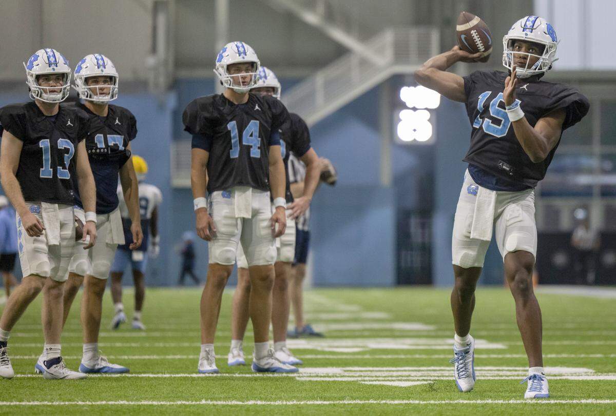 North Carolina sophomore quarterback Conner Harrell (15) runs through a drill during the Tar Heels’ practice on Thursday, April 11, 2024 in Chapel Hill, N.C.