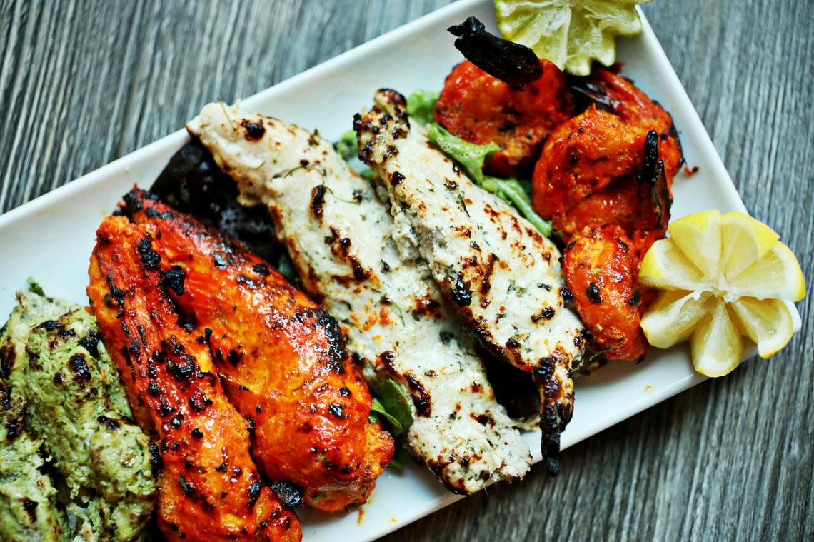 Lime & Lemon’s Tandoor Platter is a sampler of hariyali murg kebab, tandoori shrimp, lamb chops and tandoori chicken.