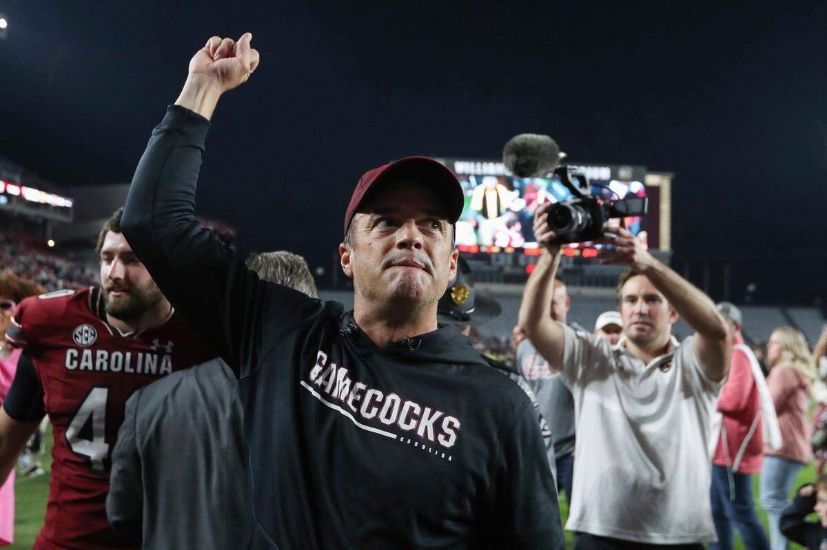 South Carolina coach Shane Beamer raises his fist after the team’s win over Texas A&M in an NCAA college football game Saturday, Oct. 22, 2022, in Columbia, S.C.