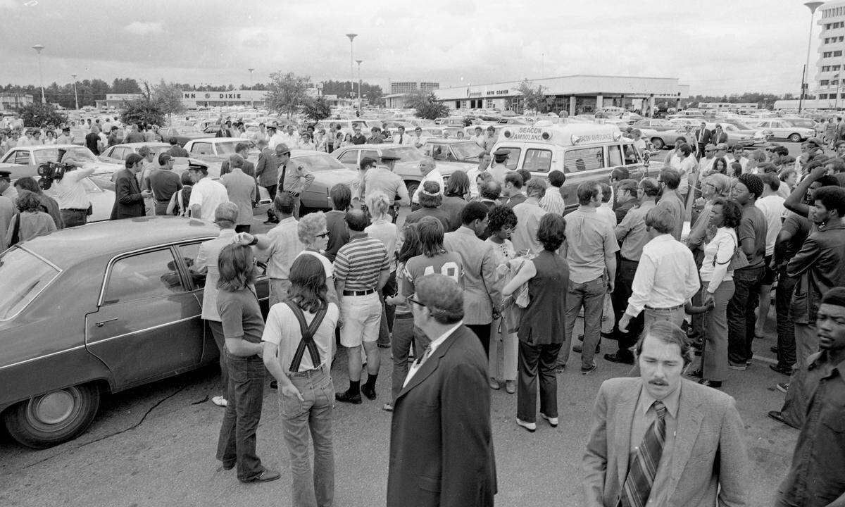 The chaotic scene outside of the main entrance to North Hills Mall, May 29, 1972 following a Memorial Day shooting where a gunman opened fire on shoppers outside of the shopping center, killing four and injuring seven.
