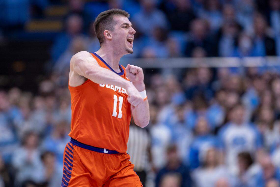 Clemson’s Joseph Girard III (11) reacts after a basket in the first half to give the Tigers’ a ten point lead over North Carolina on Tuesday, February 6, 2024 at the Dean E. Smith Center in Chapel Hill, N.C. Girard scored 21 points in the victory.