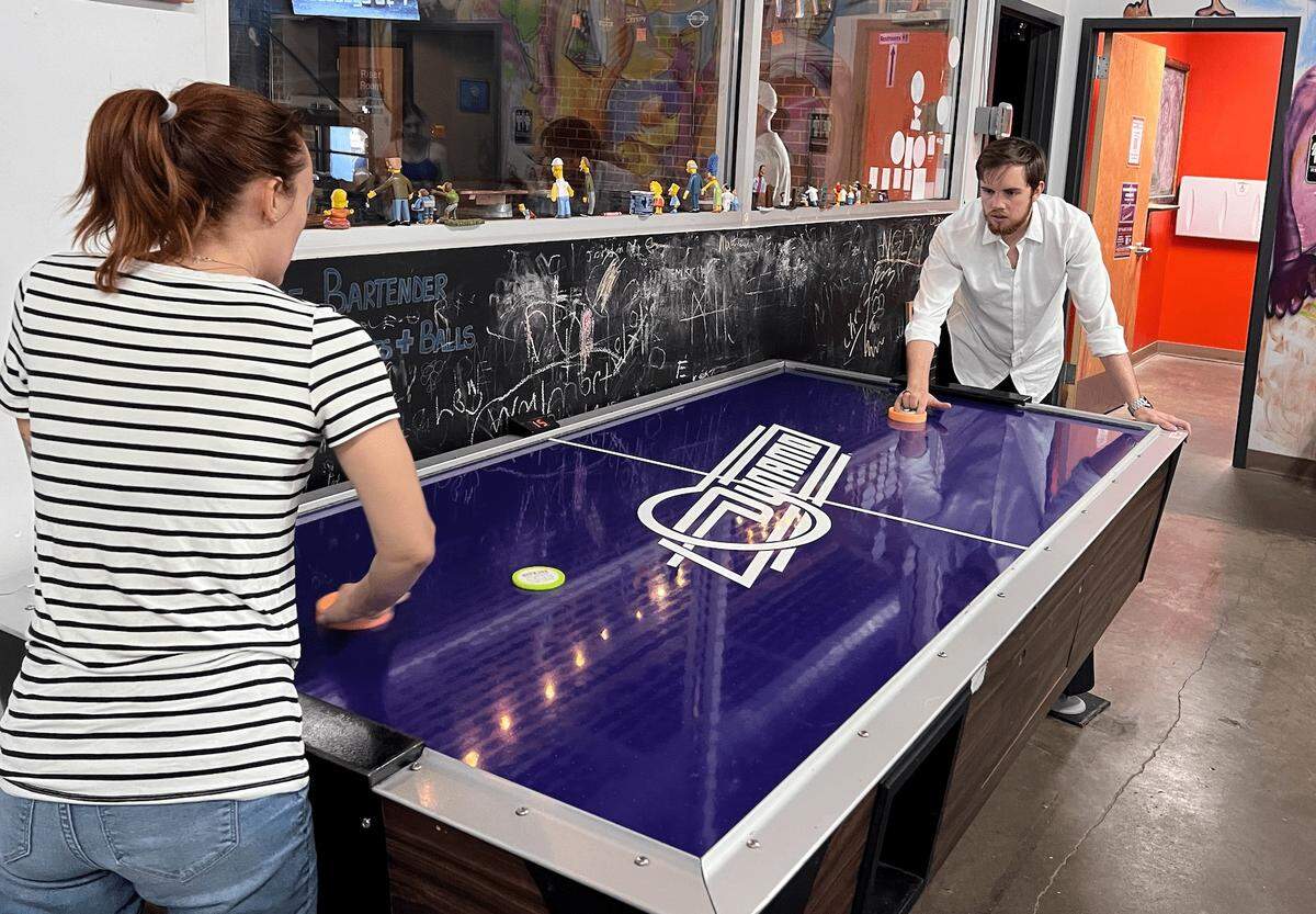 Steve Olson, the founder of the new Super Rad Arcade Lounge in Raleigh, is a competitive air hockey player and will have some tables available at the arcade bar.