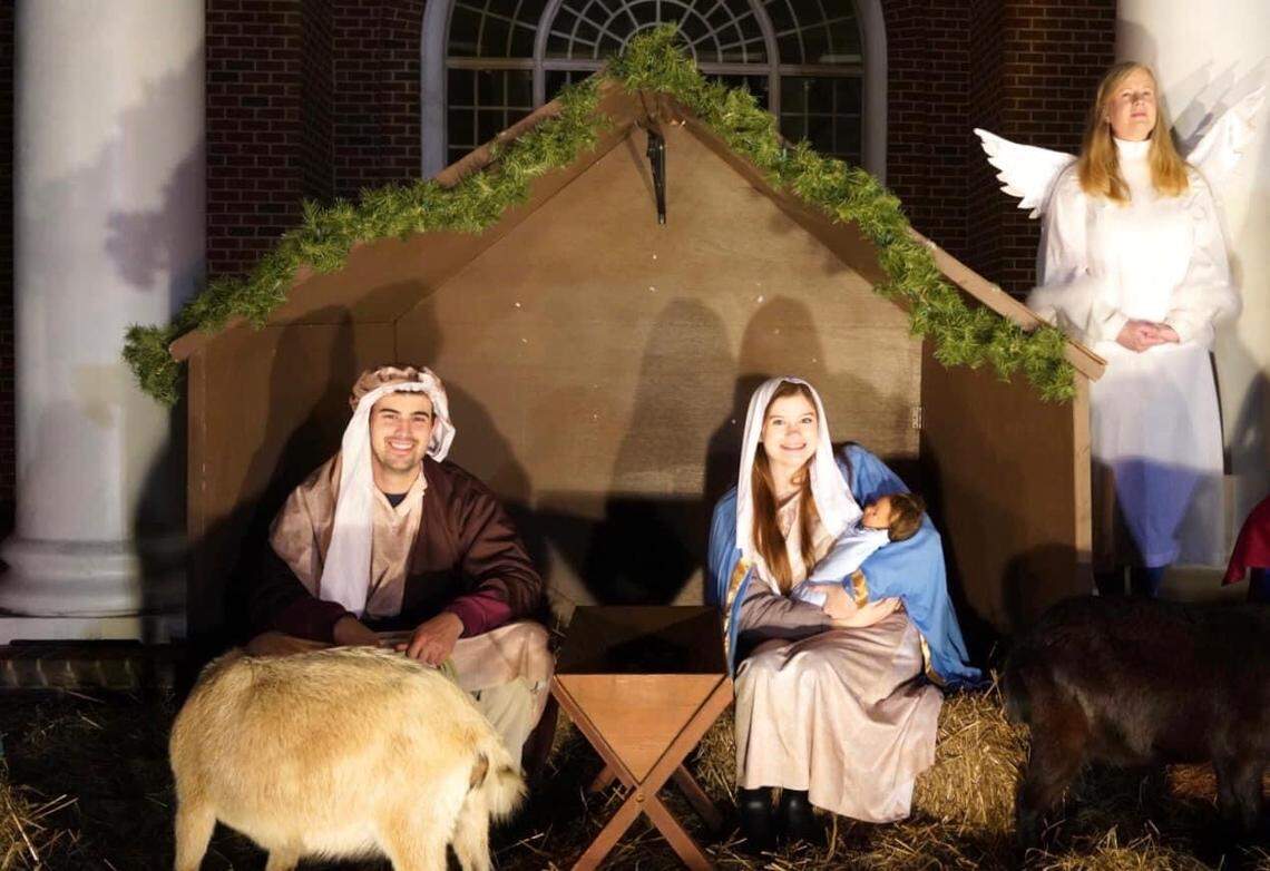 Members of the congregation of Christ’s Sanctified Holy Church in Raleigh play Mary, Joseph and an angel in the 2019 Living Nativity. At this year’s event, visitors will stay in their cars to observe COVID-19 social-distancing rules.