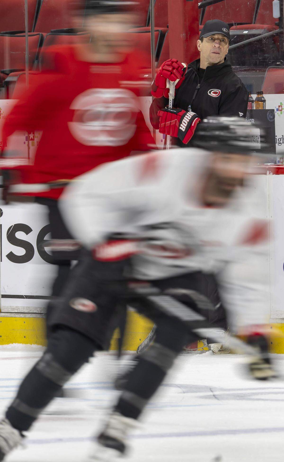 Carolina Hurricanes coach Rod Brind’Amour watches his players attach the goal, during practice on Tuesday, May 12, 2026, at Lenovo Center in Raleigh, N.C.