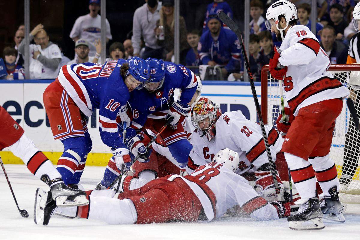 Carolina Hurricanes goaltender Antti Raanta makes a save against New York Rangers left wing Artemi Panarin (10) during the first period of Game 3 of an NHL hockey Stanley Cup second-round playoff series, Sunday, May 22, 2022, in New York. The Rangers won 3-1. (AP Photo/Adam Hunger)
