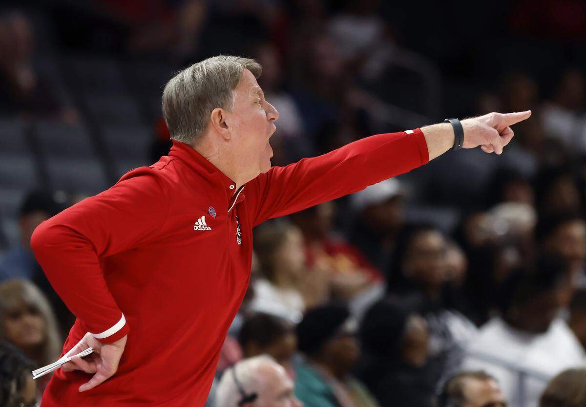N.C. State head coach Wes Moore gives instructions during the second half of the Wolfpack’s 69-68 loss to Southern California in the Ally Tipoff game on Sunday, Nov. 9, 2025, at Spectrum Center in Charlotte, N.C.