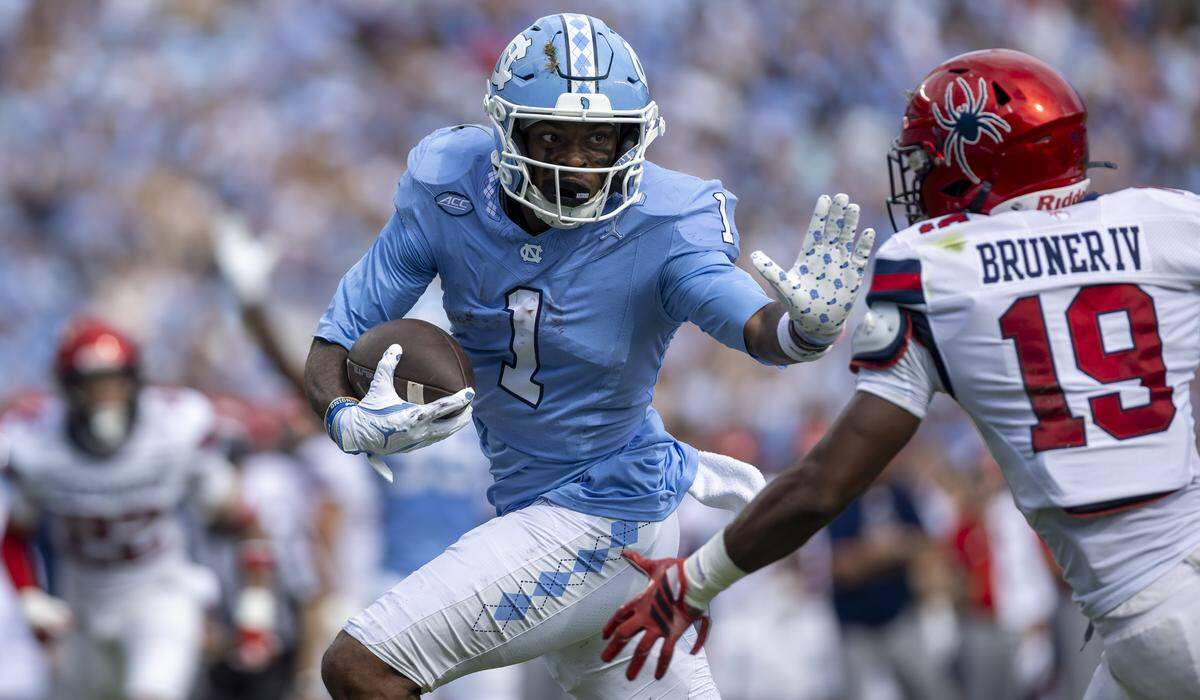 North Carolina wide receiver Jordan Shipp (1) scores on a 29-yard pass reception from quarterback Gio Lopez (7) in the first quarter on Saturday, September 13, 2025 at Kenan Stadium in Chapel Hill, N.C.