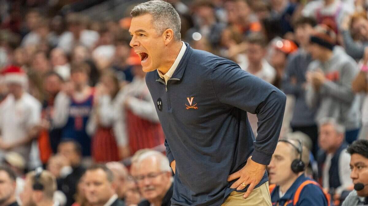 Virginia head coach Tony Bennett yells during the first half of an NCAA college basketball game against Houston in Charlottesville, Va., Saturday, Dec. 17, 2022. (AP Photo/Erin Edgerton)