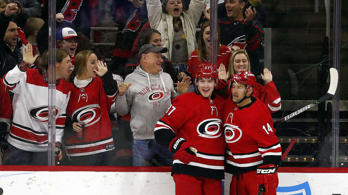 Carolina Hurricanes forward Justin Williams (14), is congratulated on his goal by teammate Andrei Svechnikov (37) during the Hurricanes’ 4-1 win over the Winnipeg Jets on Tuesday