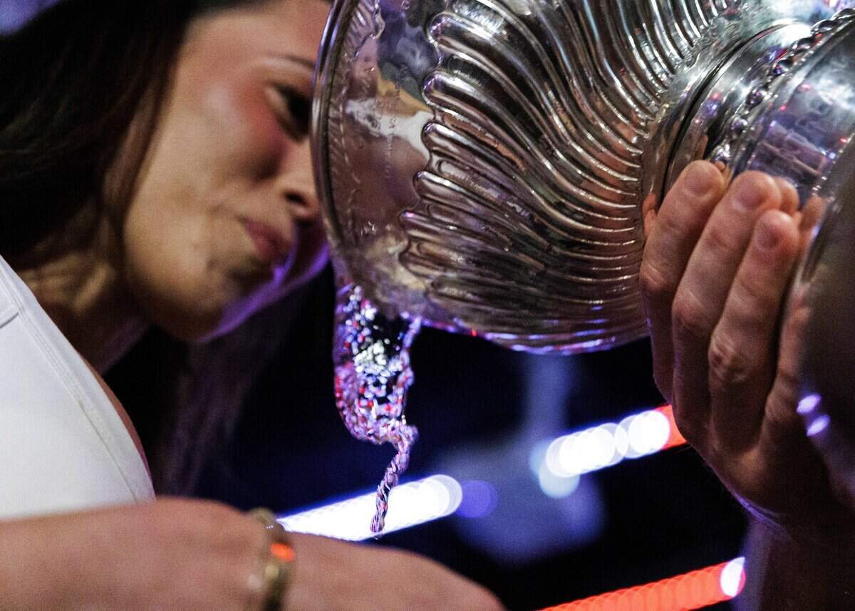 The Stanley Cup makes an appearance at Teets bar in Raleigh's Glenwood South district on Monday, June 15, 2026, as Carolina Hurricanes fans celebrated with the team’s players and staff following the Hurricanes’ Stanley Cup final 4-2 victory over the Vegas Golden Knights the evening prior.