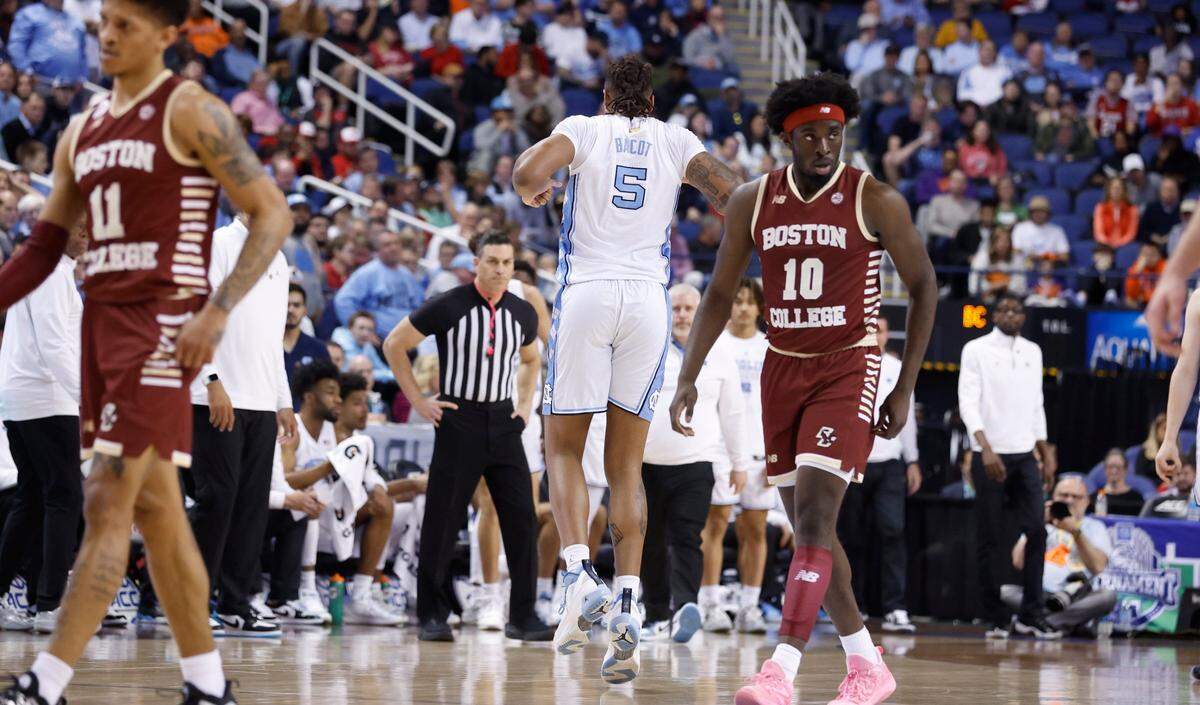 North Carolina’s Armando Bacot (5) heads back to the bench after he was injured during the first half of UNC’s game against Boston College in the second round of the New York Life ACC Men’s Basketball Tournament in Greensboro, N.C., Wednesday, March 8, 2023.