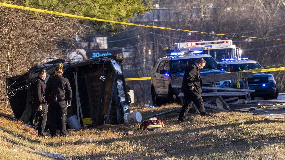 Raleigh police officers and firefighters work the scene of a crash on Interstate 440 between New Bern Avenue and Brentwood Road that “concerns an officer-involved shooting,” the Raleigh Police Department said Tuesday, Jan. 11, 2022.