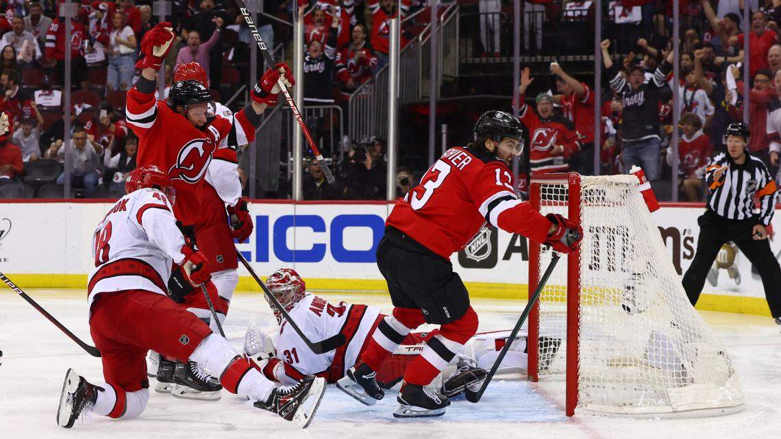 New Jersey Devils center Nico Hischier (13) scores a goal against the Carolina Hurricanes during the second period in game three of the second round of the 2023 Stanley Cup Playoffs at Prudential Center.