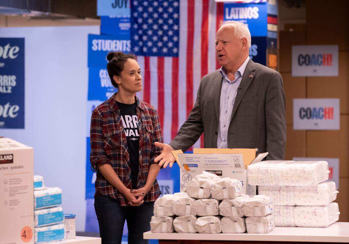 Democratic vice presidential candidate and Minnesota Gov. Tim Walz thanks volunteers for packing supplies for Hurricane Helene relief during a visit to a campaign field office on Thursday, Oct. 17, 2024, in Durham, N.C.