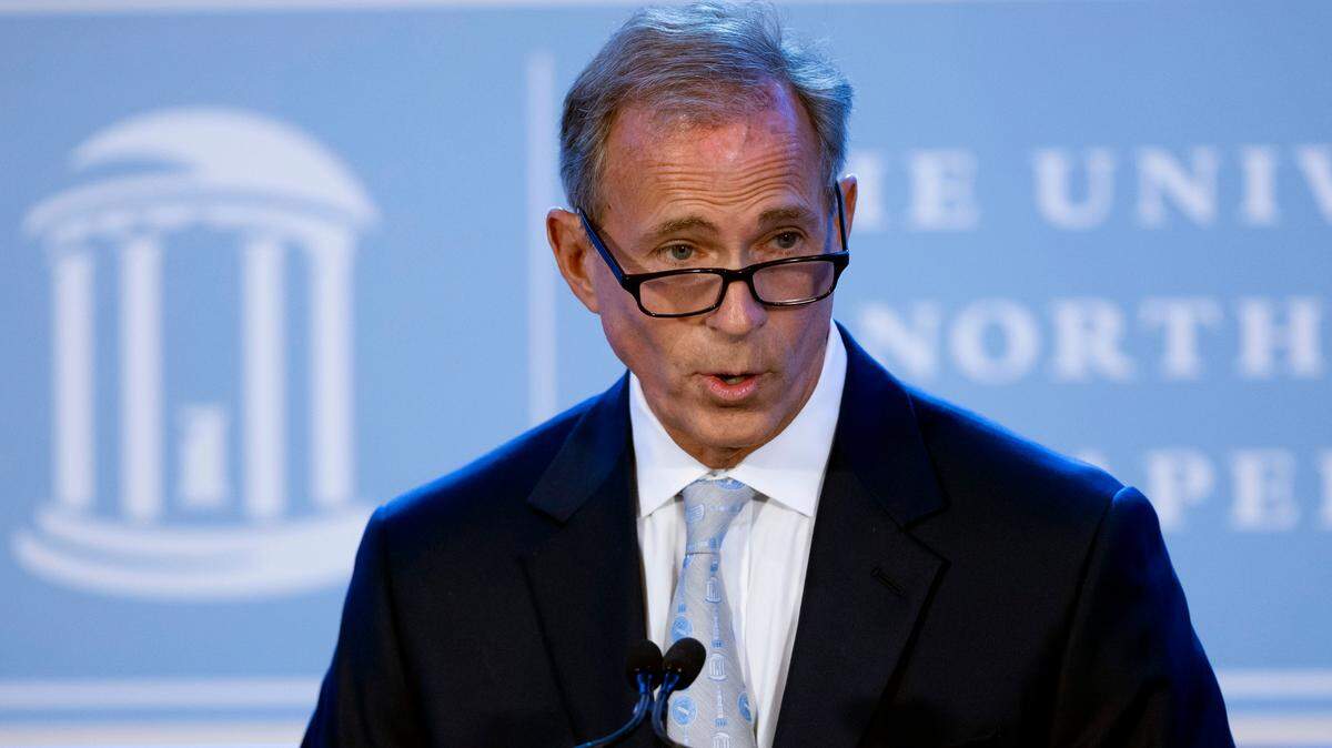 John Preyer, chair of the University’s Board of Trustees, introduces Lee Roberts as the 13th chancellor at the University of North Carolina on Friday, August 9, 2024 at the Kenan-Flagler Business School in Chapel Hill, N.C.