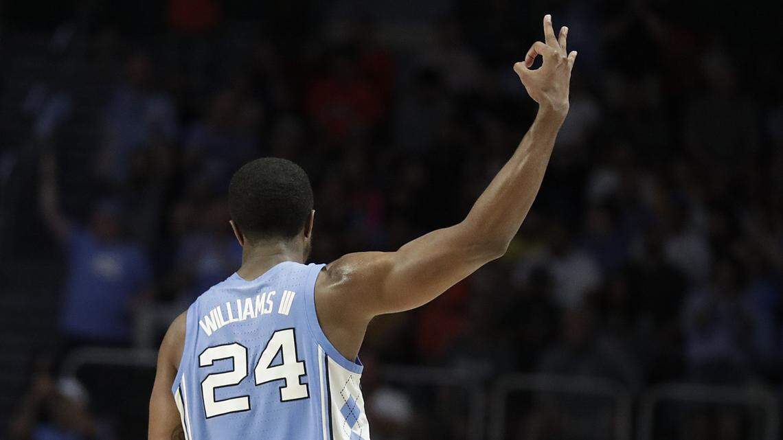 North Carolina Tar Heels guard Kenny Williams gestures after scoring a three point basket during the second half of an NCAA college basketball game against the Miami Hurricanes on Saturday, Jan. 19, 2019, in Coral Gables, Fla. (AP Photo/Brynn Anderson)