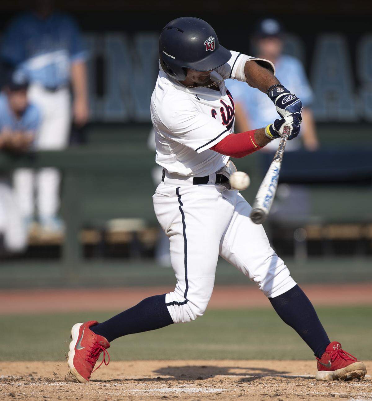 Liberty’s Cam Locklear (18) strikes out with bases loaded in the third inning against North Carolina pitcher Hansen Butler (24) during the NCAA regional on Saturday, June 1, 2019 at Boshamer Stadium in Chapel Hill, N.C.