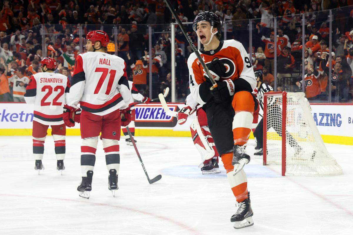 Porter Martone (94) of the Philadelphia Flyers celebrates teammate Tyson Foerster’s goal against the Carolina Hurricanes during the first period of Game 4 of the teams’ second-round Stanley Cup playoff game at Xfinity Mobile Arena on May 9, 2026 in Philadelphia, Pennsylvania.