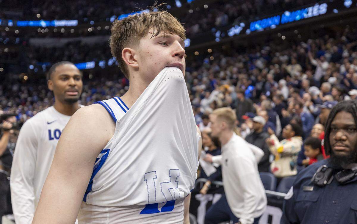 Duke guard Nikolas Khamenia (14) leaves the court after falling to Connecticut  73-72 victory on Sunday, March 29, 2026, in the NCAA East Regional Championship, at Capital One Arena in Washington, D.C.
